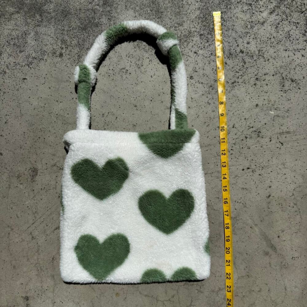 Green and white fur heart